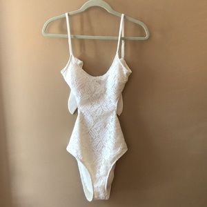 American Eagle one piece bathing suit in ivory. Never worn with tags! Size 10